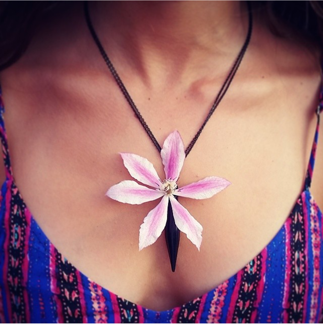 Black Vase Necklace holding a Clematis Flower by Fleurings Jewelry